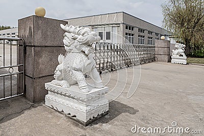 Stone Kylin Qilin statue in China. Mythical chinese chimerical creature like lion dragon with hooves Stock Photo