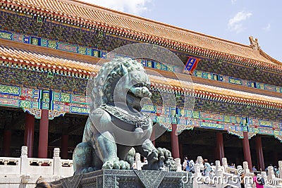 Stone lion in front of the Forbidden City Editorial Stock Photo