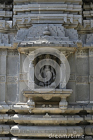 Stone masonry Shikhara with carvings of statue of Vishnu the God at Vitthal Temple, Palashi, Parner, Ahmednagar Stock Photo