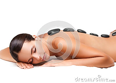 Stone Massage. Beautiful Woman Getting Spa Hot Stones Massage. S Stock Photo