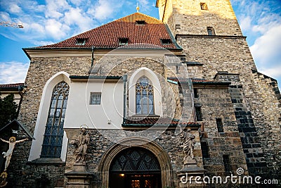 Stone medieval gothic church St. Henry and St. Kunhuty at sunny day, high tower, stone statues, stained glass windows, arched Editorial Stock Photo