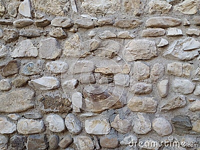 Stone medieval wall background, close up. Stock Photo