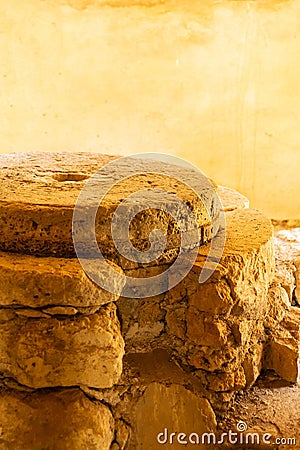 Stone millstones traditional way extracting flour grinding millet hand mill vertical design Stock Photo