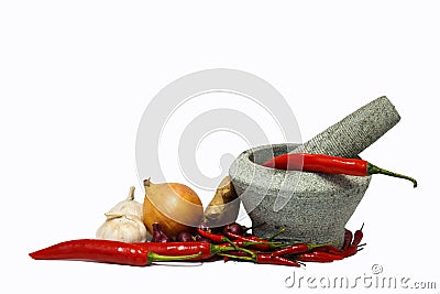 Stone mortar with fresh flavoring herbs and spices. Stock Photo