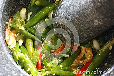 Stone mortar and pestle Stock Photo