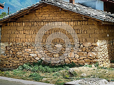 Stone and mud brick built barn in rural China Editorial Stock Photo