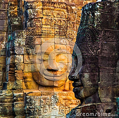 Stone murals and statue Bayon Temple Angkor Thom. Angkor Wat the Stock Photo