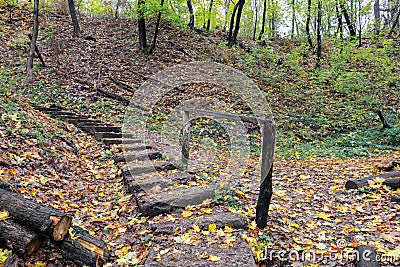 Stone old staircase in the autumn forest Stock Photo