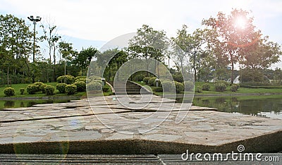 Stone path across the pond Stock Photo