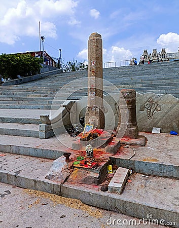 Stone pillar and an idol for worshipping Lord Vishnu at the banks of River Kabini in T Narshipura, Mysore Editorial Stock Photo