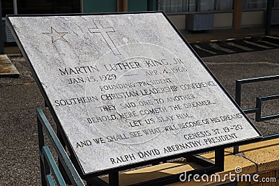 A stone plaque with Martin Luther King`s name in front of the civil rights museum in the downtown Memphis Editorial Stock Photo
