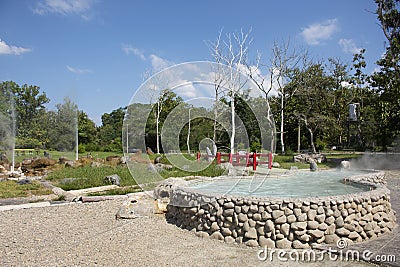 Stone pool mineral hot water for thai people and foreign travelers travel visit and cooking boiling eggs in San Kamphaeng Hot Stock Photo