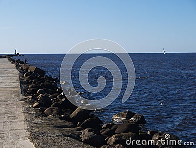 Stone road ruins towards the sea Stock Photo