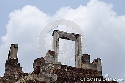 Stone ruin of ancient temple top in Angkor Wat, Cambodia. Ancient temple on sky background. Stock Photo