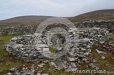 Stone Ruins of a Beehive Huts Stock Photo