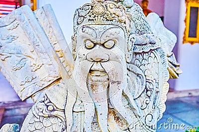 The Chinese guardian in Wat Pho temple, Bangkok, Thailand Stock Photo