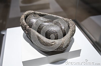 Stone sculpture depicting a fetus within an uterus, Inca Culture Editorial Stock Photo