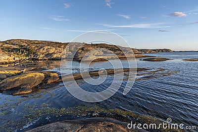 Stone shore at Orust in Sweden Stock Photo