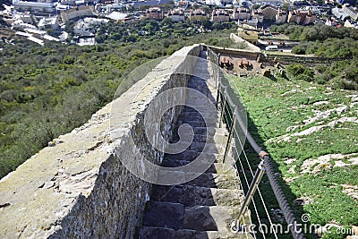 a stone staircase leading down to the coast. Editorial Stock Photo