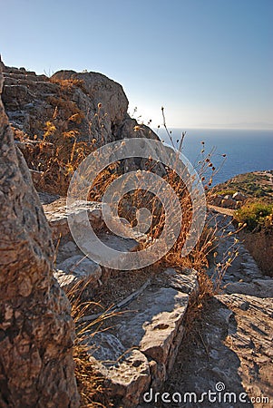 Stone stairs, sea and sky. Monolithos, Rodhes island. Greece Stock Photo
