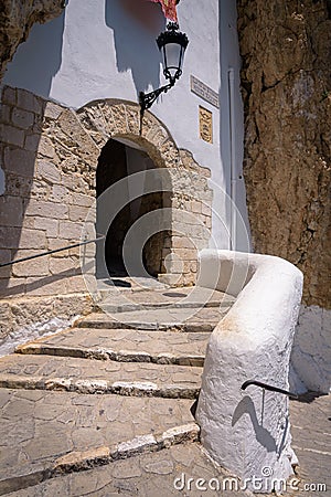 Stone stairs to the entrance door to the castle of Guadalest, Alicante, Spain Stock Photo