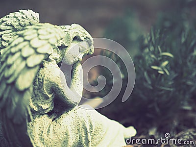 Stone statue, angel, garden decoration Stock Photo