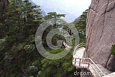 Stone Steep Steps . Trekking walking hiking Huangshan Mountain. Stock Photo