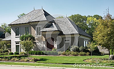 Stone & Stucco House with Slate Roof Stock Photo