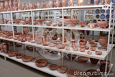 Stone tableware and dishes for sale in a tourist shop in Turkey. figurines made of onyx in souvenir store Editorial Stock Photo