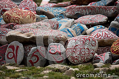 Stone with tibetian mantras Tibet sanscrit Editorial Stock Photo