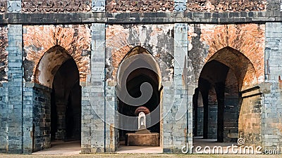 A stone tomb in the ruins of the ancient Adina Masjid mosque in the village of Pandua Stock Photo