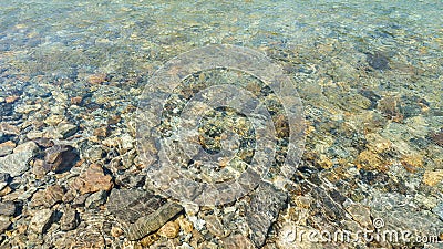 Stone under transparent water Stock Photo
