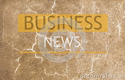 wall background with the inscription business news Stock Photo