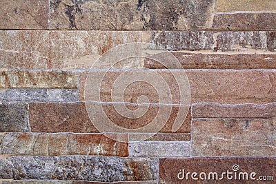 Stone wall background. Texture of various minerals Stock Photo