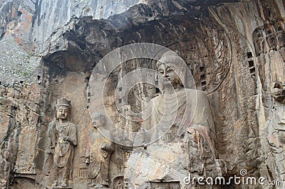 Stone Wall Carved Statues, Buddhist Longmen Caves, China Stock Photo
