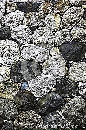 Stone wall with different sized stones Stock Photo