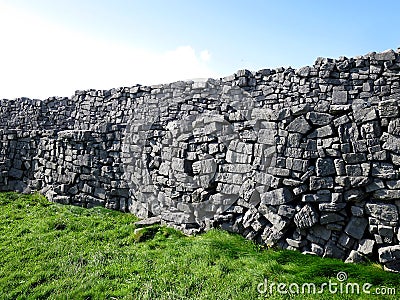 The stone wall of the Dun Aengus on Inis MÃ³r Island, IRELAND Stock Photo