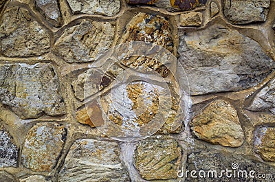 A stone wall with random shapes and sizes Stock Photo