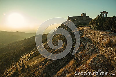 Stone wall and tower of Castle over ridge in Marvao Stock Photo