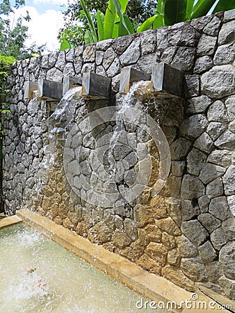 Stone Wall Water Fountain Stock Photo