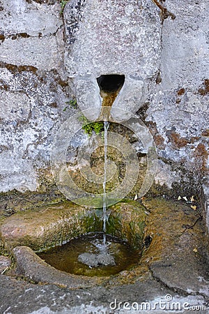 Stone water source Stock Photo