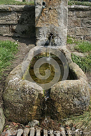 Stone Water Trough Stock Photo