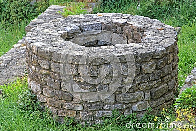 Stone Water Well Stock Photo