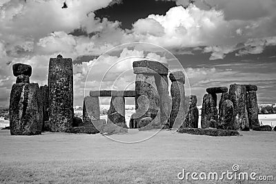 Stonehenge historic site under cloud sky. Stonehenge is a UNESCO Stock Photo