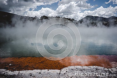 stones and bubbles in the hot water of the broken lake Stock Photo