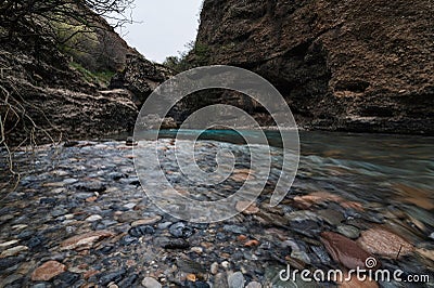 stones in mountain river in mountains in Aksu canyon in Kazakhstan Stock Photo