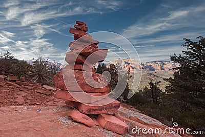 Stones rocks balancing in harmony with tranquil landscape. Stock Photo