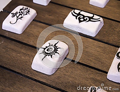 Stones with tattoo design Stock Photo