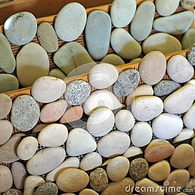 Beach stones for outdoor pavements, swimming pools and gardens Stock Photo