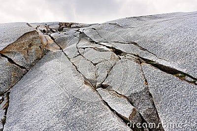 Stony embossed rocks of the Rhone Glacier at Furka Pass, Valais, Switzerland. Stock Photo